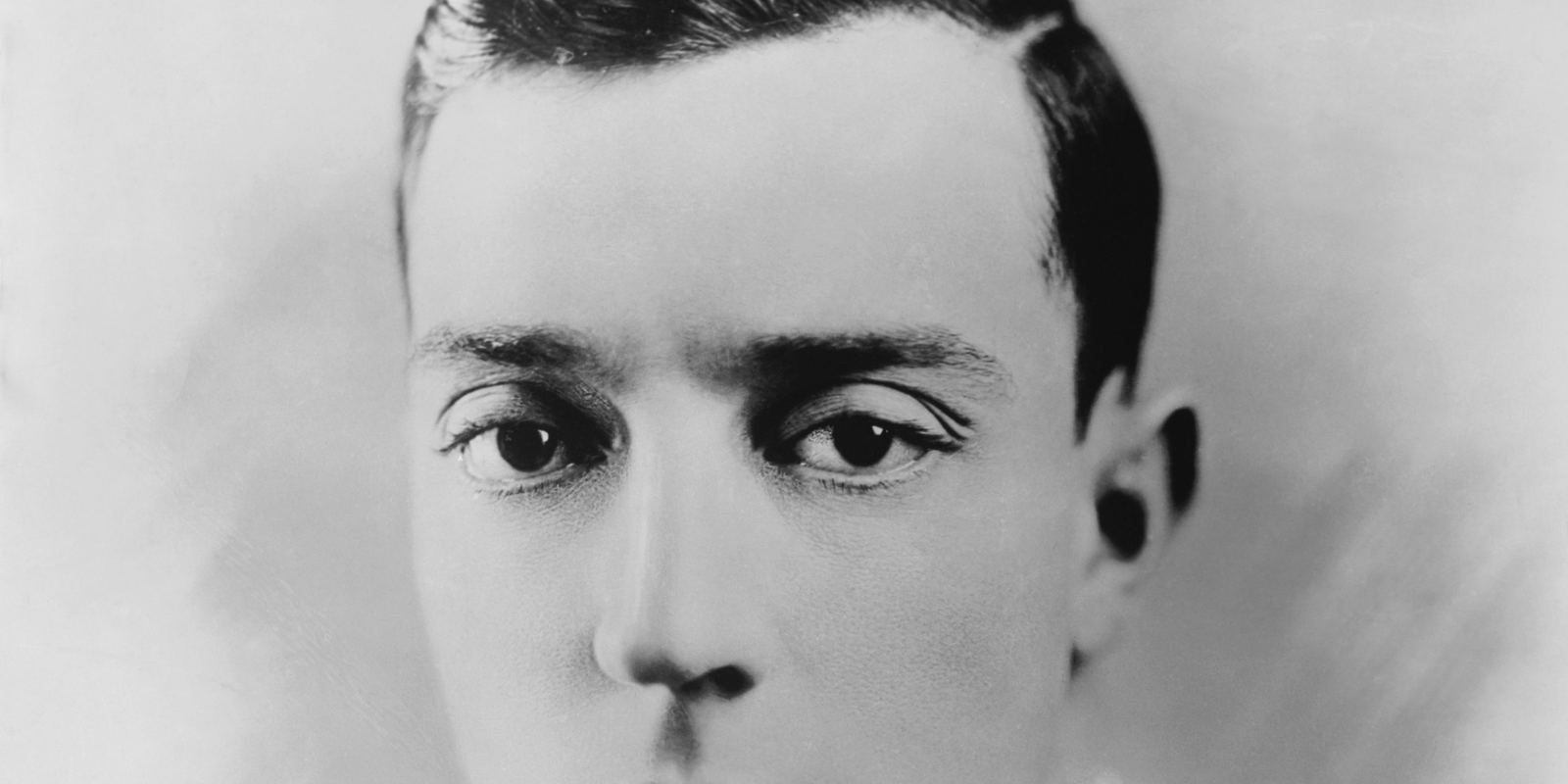 A black and white portrait of Buster Keaton in the 1920s