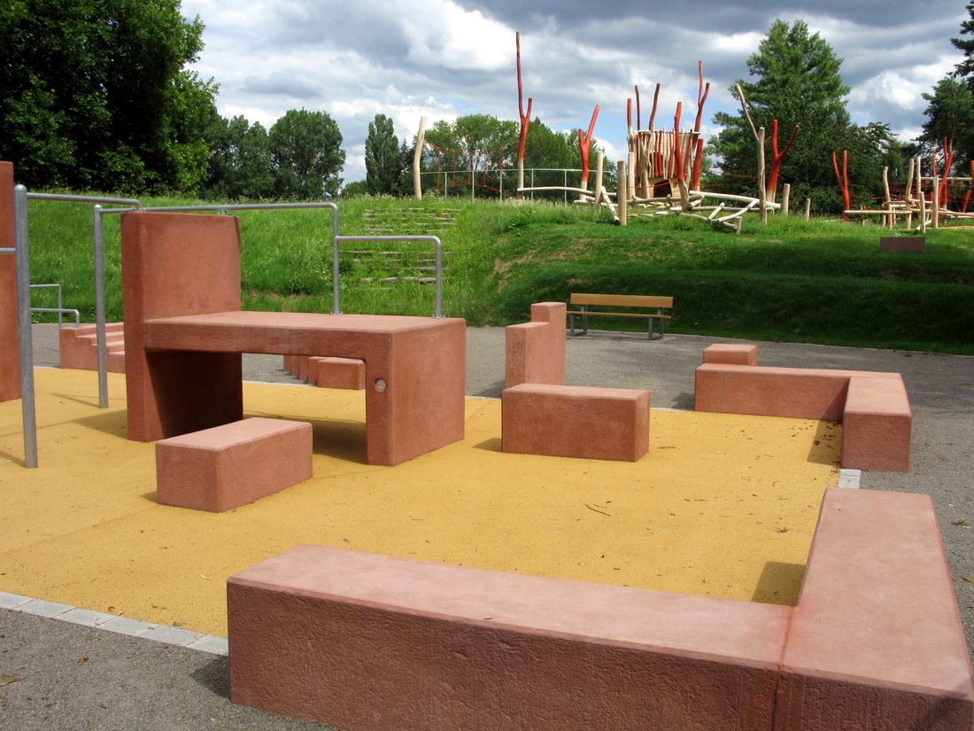 Low concrete blocks and bars at a parkour training area in Freiburg